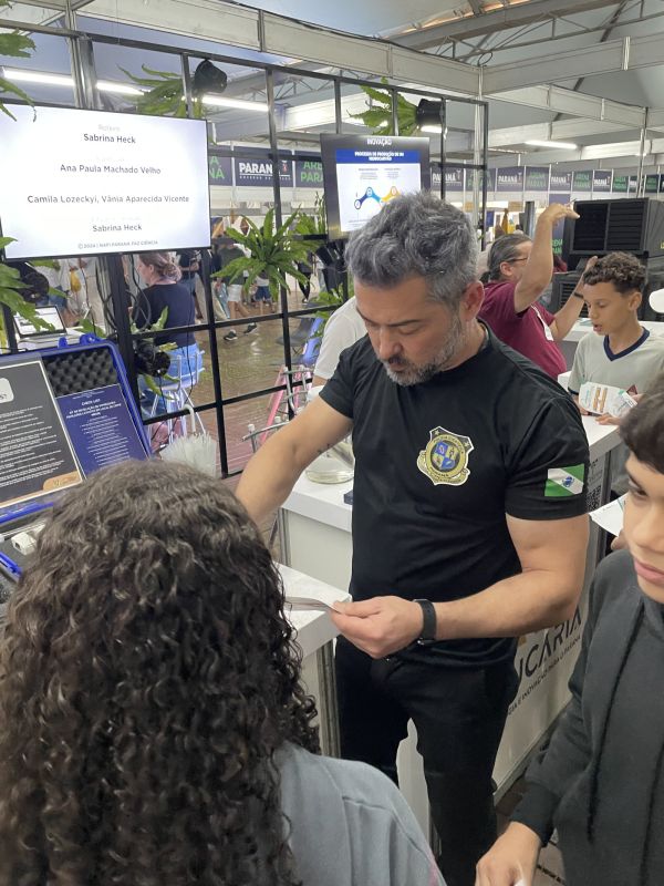 Estande NAPI Forense — Paraná Faz Ciência 2024